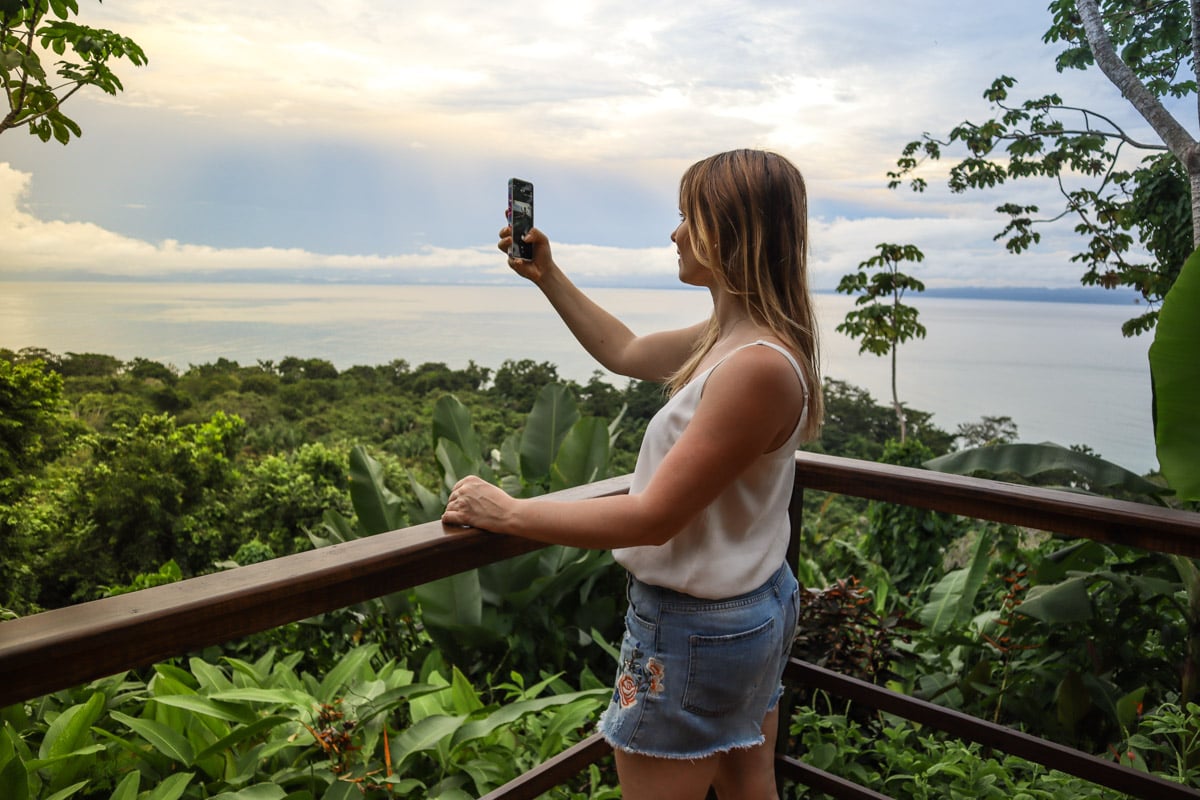 Taking photos of the views from my terrace at Lapa Rios, Costa Rica